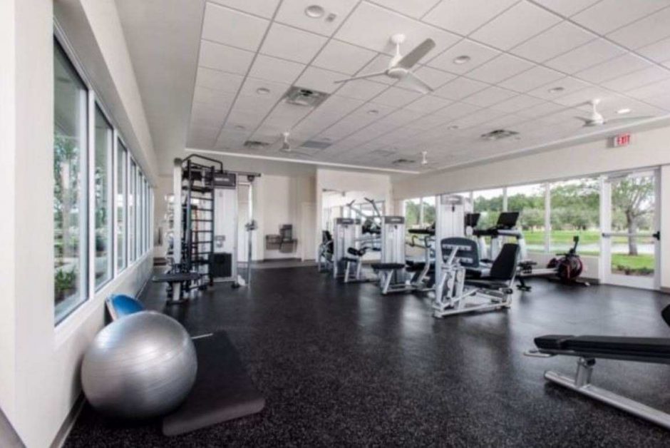 Room with Fitness Equipment and grey speckled tile floor