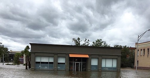 Commercial building with flood waters