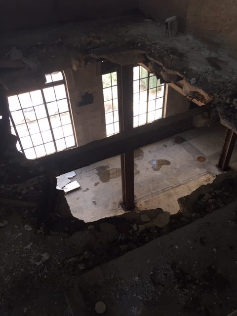 Old building with hole in floor