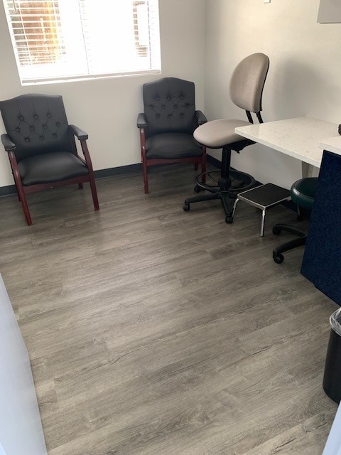 Patient exam room with chairs