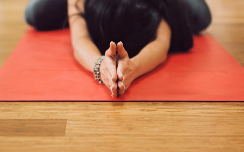 woman on yoga mat
