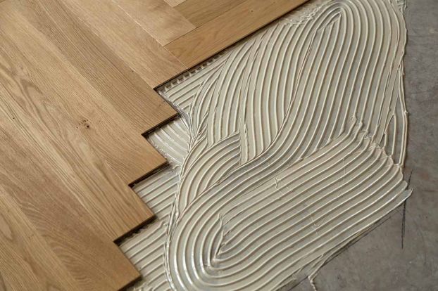 ADHESIVE AND WOOD